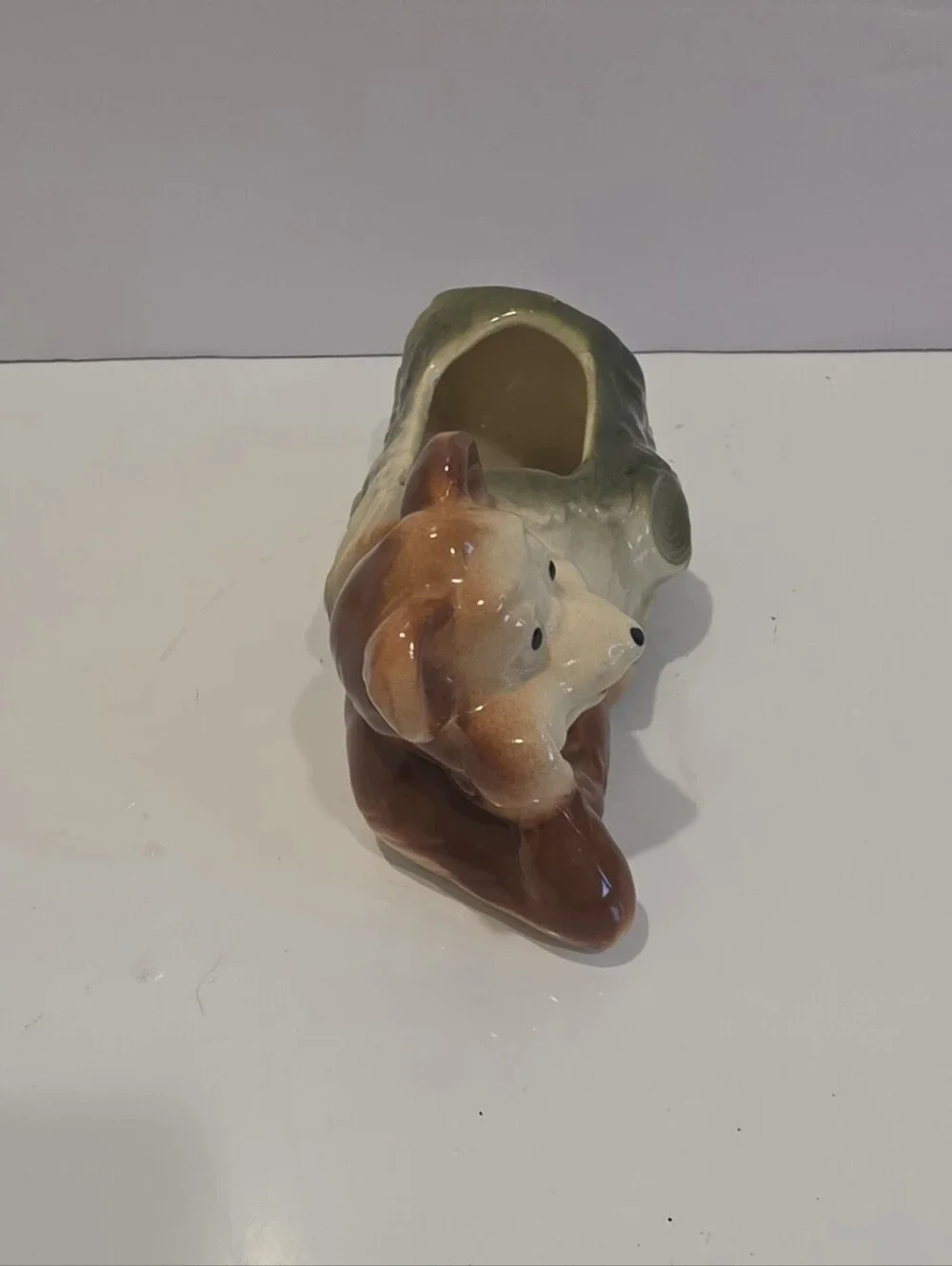 Vintage Ceramic Planter Featuring A Whimsy Bear Lounging Next To A Log.